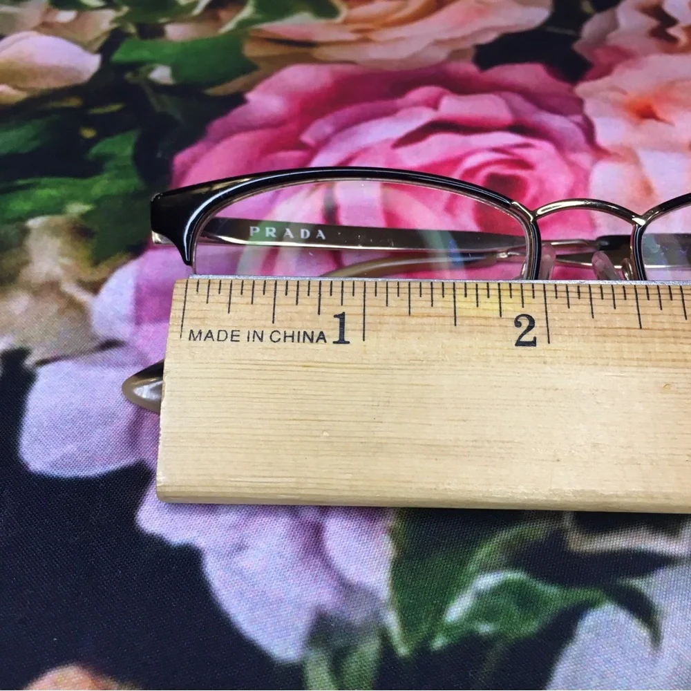 Prada Black top rim & Gold metal bottom rim and arms Good stored condition